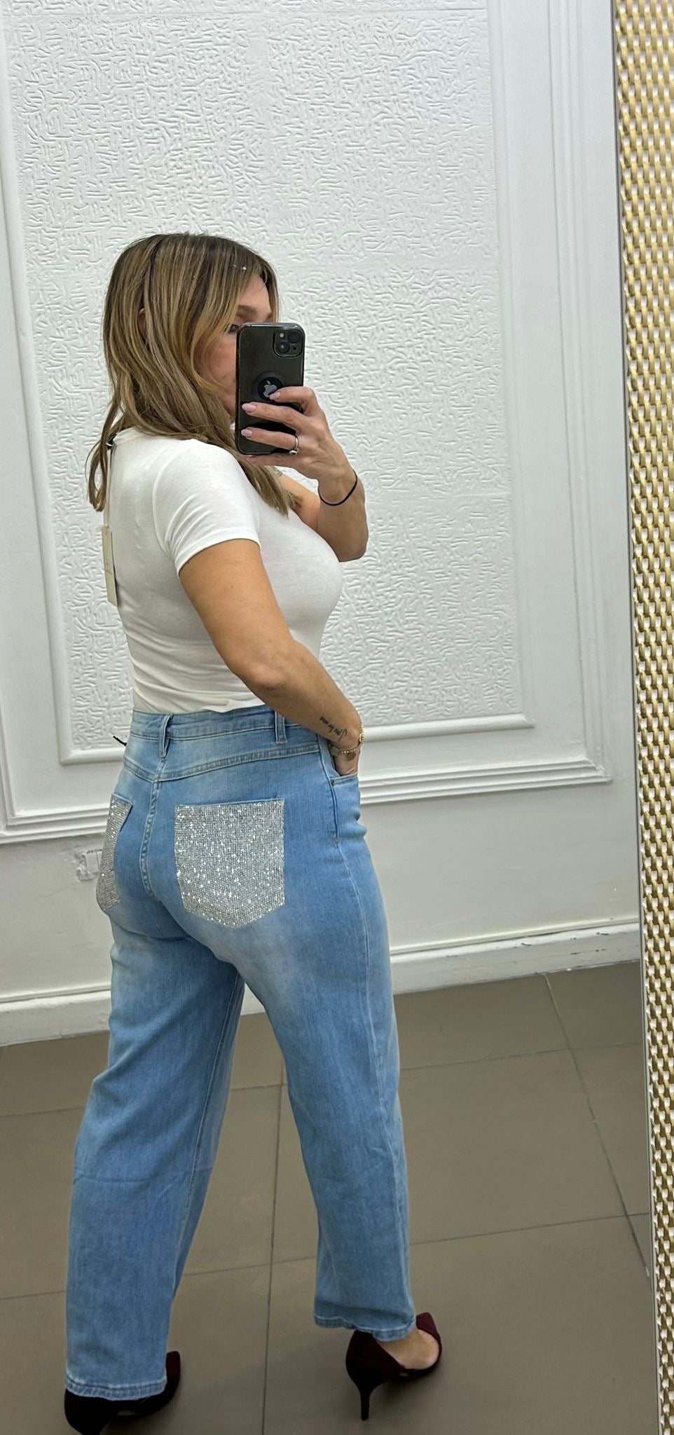 Jeans con tasca glitter argento